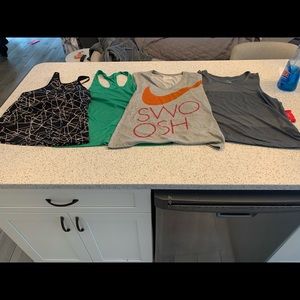4 for 30’ yes 4 brand new Nike tops 3 m 1 no snags or stains